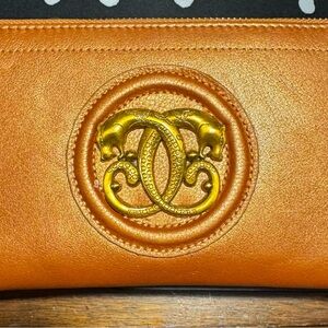 Sharif 1827 Metallic Orange copper Leather wristlet, wallet with gold Emblem